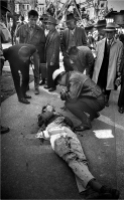 #115-B-8 San Francisco Chinatown Portsmouth Square Stabbing Victim being questioned by police. 1967